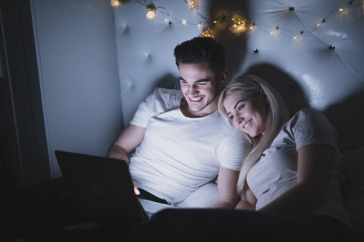 beautiful-couple-watching-movie-at-night_23-2147771154.jpg